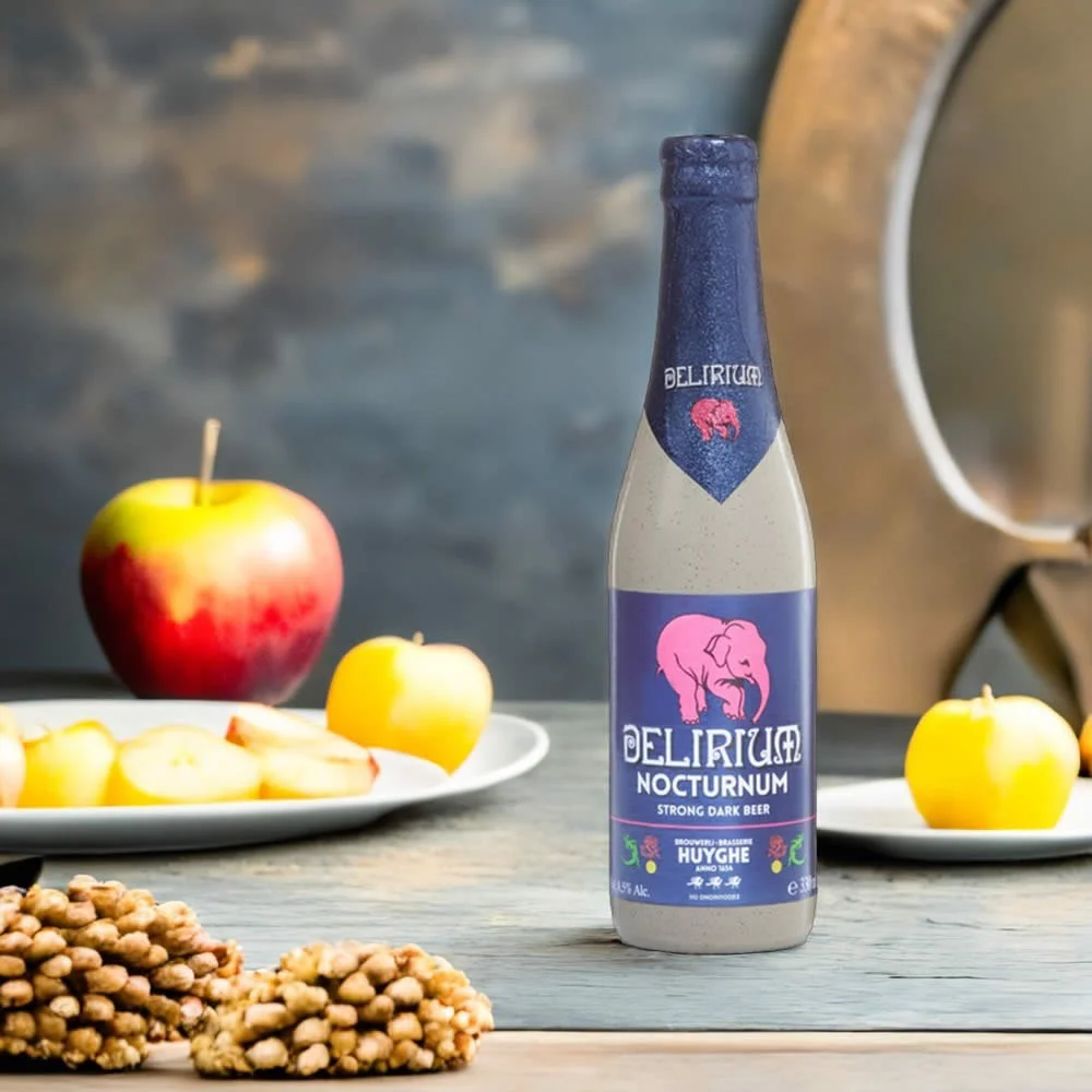 Cerveza Delirium Nocturnum con manzanas